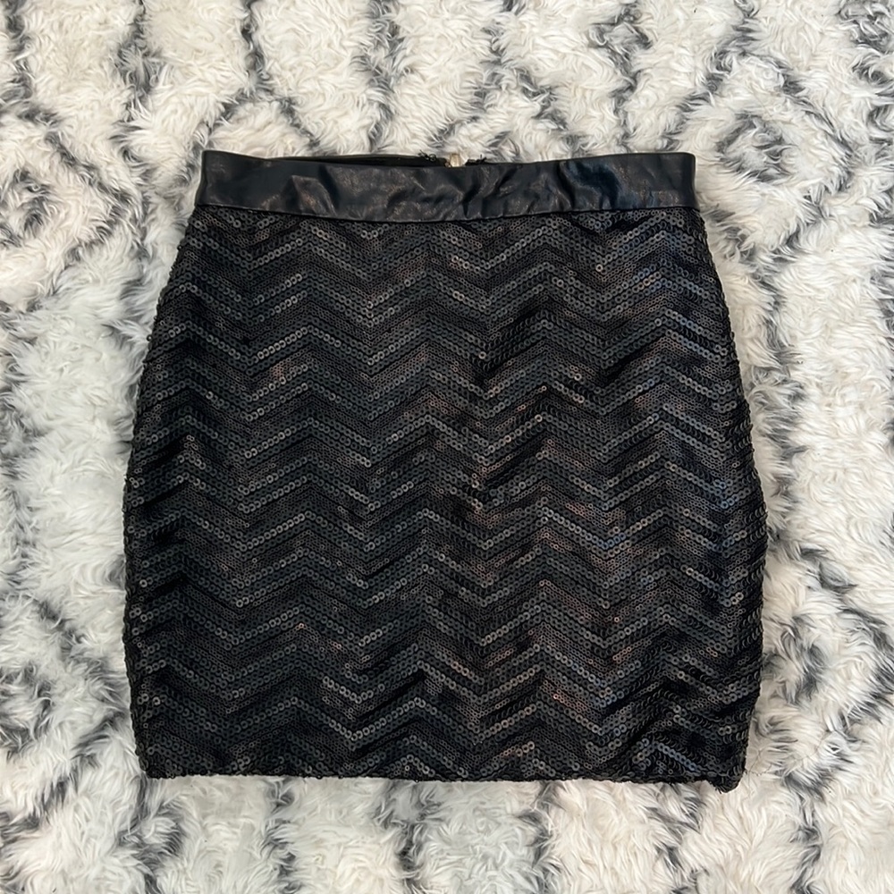 Sequined black mini skirt